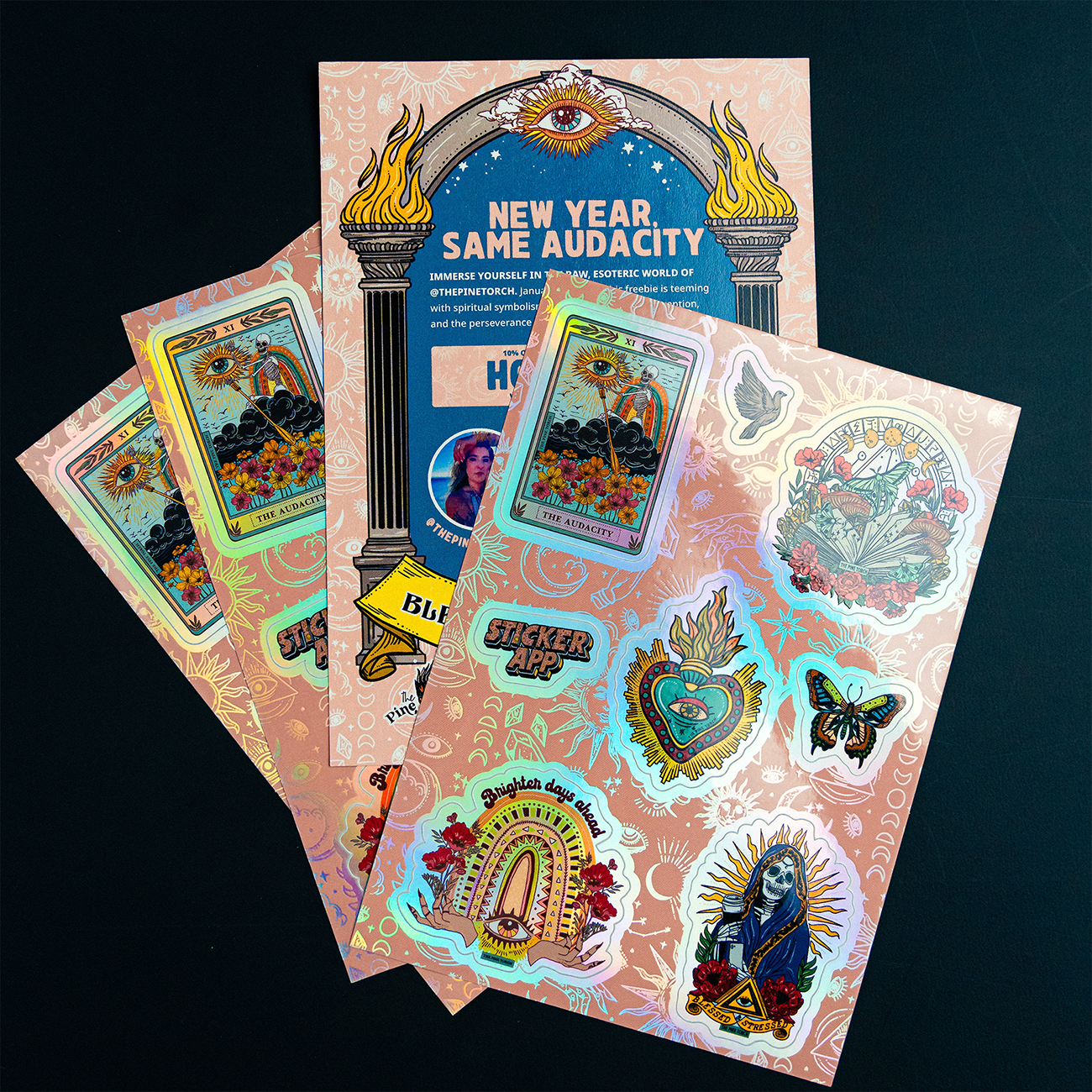 Holographic sticker sheets with pink esoteric pattern and bohemic designs on a dark background